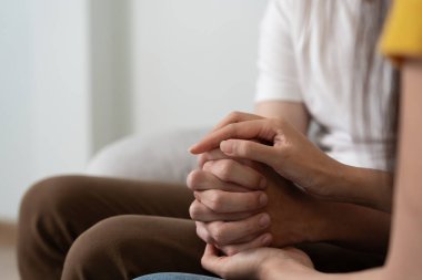 Couple hold hand support each while discussing family issues with psychiatrist. Husband encourages and empathy wife suffers depression. psychological, save divorce, Hand in hand together, trust, care