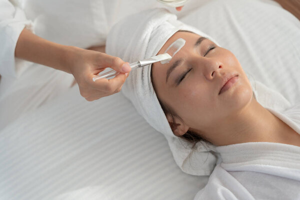 Beautiful woman spa and treatment skin of face. face of a healthy woman apply cream. Advertisement for skin cream, anti-wrinkle, baby face, whitening, moisturizer, tighten pores serum, youthfu