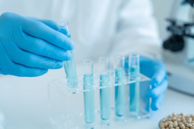 Scientist analyze biochemical sample in advanced scientific laboratory. Medical professional check chemical mix microbiological developmental of viral. Biotechnology research in science lab. cosmetic