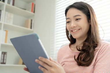 woman using smartphone for online shopping at home. stay home, technology, electronic commerce, internet, market place, final or summer or big sale, payment, discount for credit, offer, Low price