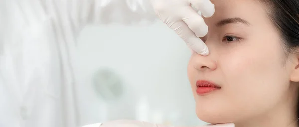 plastic surgery, beauty asian smile and happy after surgery, surgical procedure that involve altering shape of nose, doctor examines patient nose before rhinoplasty, medical assistance, healt