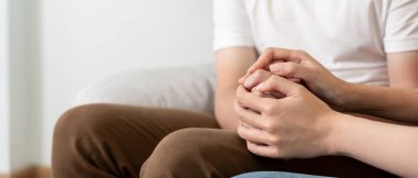 Couple hold hand support each while discussing family issues with psychiatrist. Husband encourages and empathy wife suffers depression. psychological, save divorce, Hand in hand together, trust, care