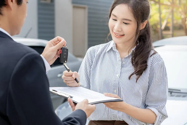 lease, rental car, sell, buy. Dealership send contract and car keys to new owner to sign. Sales, loan credit financial, rent vehicle, insurance, renting, Seller, dealer, installment, car care busines