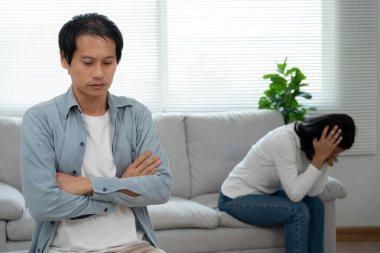 Divorce. Asian couples are desperate and disappointed after marriage. Husband and wife are sad, upset and frustrated after quarrels. distrust, love problems, betrayals. family problem, teenage lov