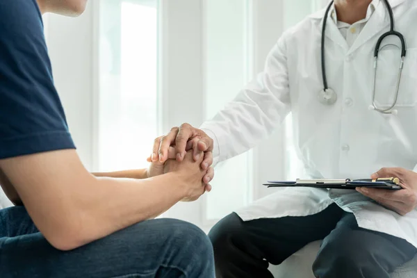 psychiatrist hold hand support each while discussing family issues. doctor encourages and empathy woman suffers depression. psychological, save divorce, Hand in hand together, trust, care