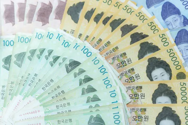 The currency of Korea which is used to represent value in exchange and the won is the main currency of Korean people. Korean won notes for money concept background.