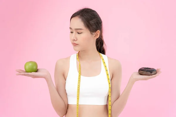 slim body asian women very bored diet food, dieting female choose low calories food for diet. Good healthy food. weight lose, balance, control, reduce fat, routines, exercise, body shap