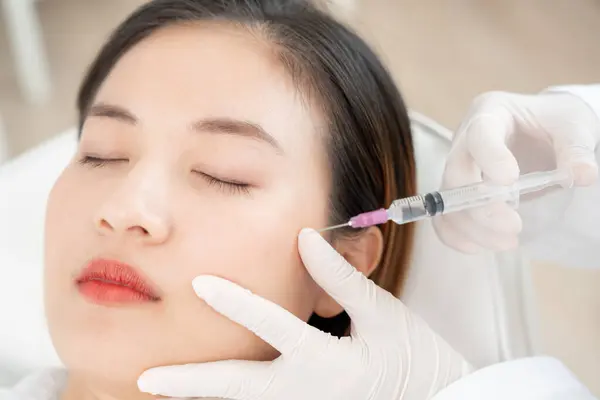 Cosmetic surgery, skin whitening injection, filler injection, Skin reface, beautiful Asian girls receive beauty treatments at beauty clinic, skincare, pore rejuvenation, wrinkle, baby face