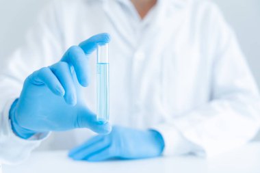 Scientist analyze biochemical sample in advanced scientific laboratory. Medical professional check chemical mix microbiological developmental of viral. Biotechnology research in science lab. cosmetic
