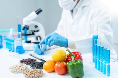 Scientist check chemical food residues in laboratory. Control experts inspect the concentration of chemical residues. hazards, ROHs standard, find prohibited substances, contaminate, Microbiologist