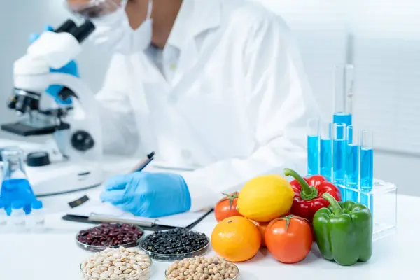 Scientist check chemical food residues in laboratory. Control experts inspect the concentration of chemical residues. hazards, ROHs standard, find prohibited substances, contaminate, Microbiologist