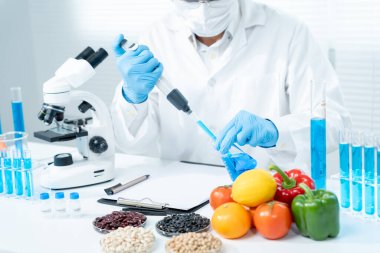 Scientist check chemical food residues in laboratory. Control experts inspect the concentration of chemical residues. hazards, ROHs standard, find prohibited substances, contaminate, Microbiologist