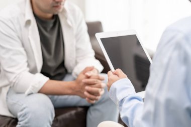 man with mental health problems is consulting. psychiatrist is recording the patient's condition for treatment. encouragement, love and family problem, bipolar , depression patient, protect suicide