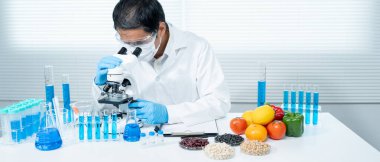 Scientist check chemical food residues in laboratory. Control experts inspect the concentration of chemical residues. hazards, ROHs standard, find prohibited substances, contaminate, Microbiologist