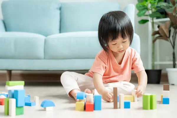 Happy Asia children play and learn toy blocks.family is happy and excited in the house. daughter having fun spending time, Activity, development, IQ, EQ, meditation, brain, muscles, essential skills
