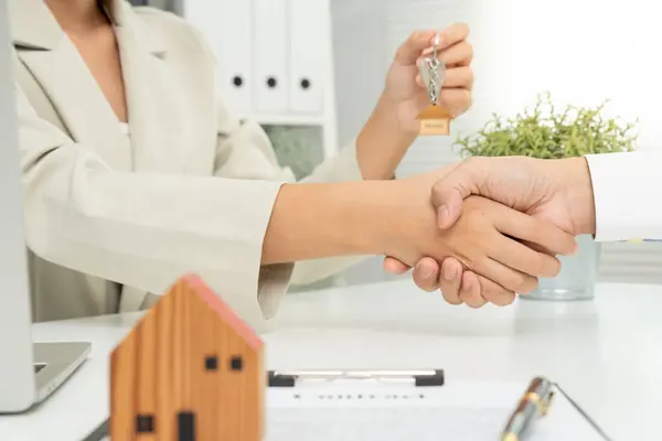 lease, rental and selling home. Dealership manager smile handshake to the new homeowner. rent house, Sales, loan credit financial, insurance, Seller, dealer, installment