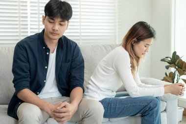 Divorce. Asian couples are desperate and disappointed after marriage. Husband and wife are sad, upset and frustrated after quarrels. distrust, love problems, betrayals. family problem, teenage lov