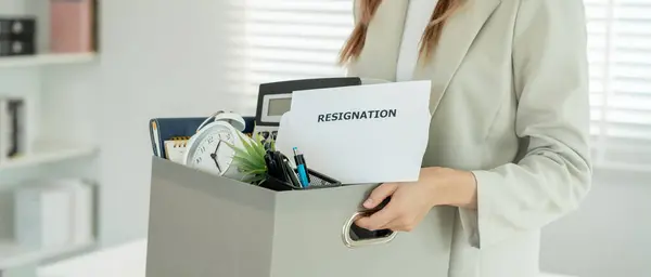 resignation, leave, quit, Stressful businesswomen will resign from the company. Female staff is lifting a brown paper box that holds personal items. , job placement and vacancies, resignation letter