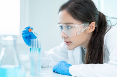 Scientist analyze biochemical sample in advanced scientific laboratory. Medical professional check chemical mix microbiological developmental of viral. Biotechnology research in science lab. cosmetic