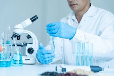 Scientist analyze biochemical sample in advanced scientific laboratory. Medical professional check chemical mix microbiological developmental of viral. Biotechnology research in science lab. cosmetic