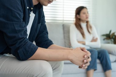 Divorce. Asian couples are desperate and disappointed after marriage. Husband and wife are sad, upset and frustrated after quarrels. distrust, love problems, betrayals. family problem, teenage lov