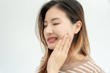 Asian woman feel toothache from gingivitis, female suffer tooth, decay problems, dental care. sensitive tooth, decay problem, bad breath, Gingival Recession, Oral Hygiene instruction, tooth extraction