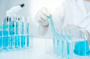 Scientist analyze biochemical sample in advanced scientific laboratory. Medical professional check chemical mix microbiological developmental of viral. Biotechnology research in science lab. cosmetic