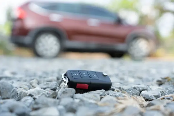 Stock image Lost car keys on the ground, Car keys dropped on the floor or fall lying on the street home front. Walking Away From Lost Car Key, can not transport, express, rush time, wast time, emergency