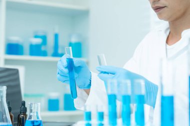 Scientist analyze biochemical sample in advanced scientific laboratory. Medical professional check chemical mix microbiological developmental of viral. Biotechnology research in science lab. cosmetic