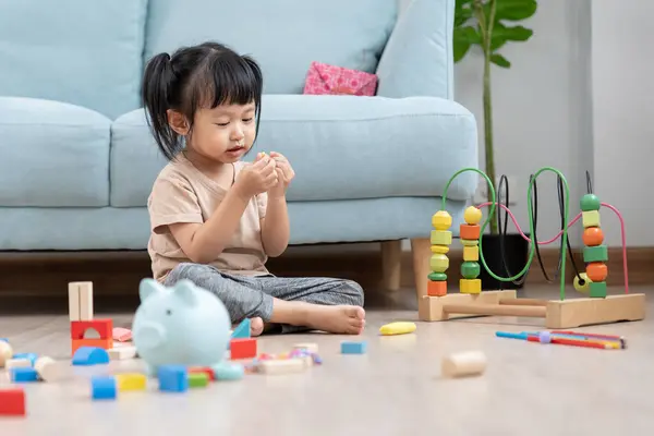 stock image Happy Asian child playing and learning toy blocks. children are very happy and excited at home. child have a great time playing, activities, development, attention deficit hyperactivity disorde