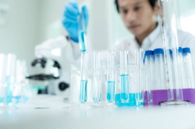 Scientist analyze biochemical sample in advanced scientific laboratory. Medical professional check chemical mix microbiological developmental of viral. Biotechnology research in science lab. cosmetic