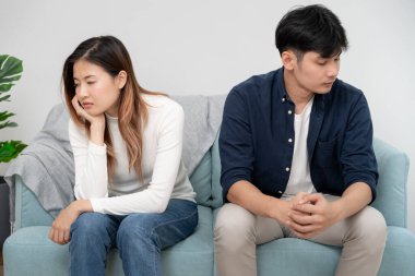 Divorce. Asian couples are desperate and disappointed after marriage. Husband and wife are sad, upset and frustrated after quarrels. distrust, love problems, betrayals. family problem, teenage lov