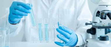 Scientist analyze biochemical sample in advanced scientific laboratory. Medical professional check chemical mix microbiological developmental of viral. Biotechnology research in science lab. cosmetic