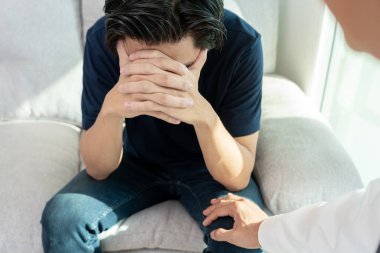 man with mental health problems is consulting. psychiatrist is recording the patient's condition for treatment. encouragement, love and family problem, bipolar , depression patient, protect suicide