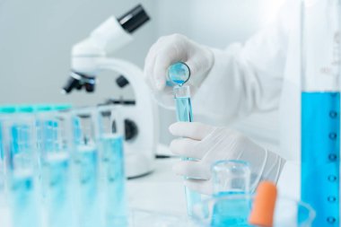 Scientist analyze biochemical sample in advanced scientific laboratory. Medical professional check chemical mix microbiological developmental of viral. Biotechnology research in science lab. cosmetic