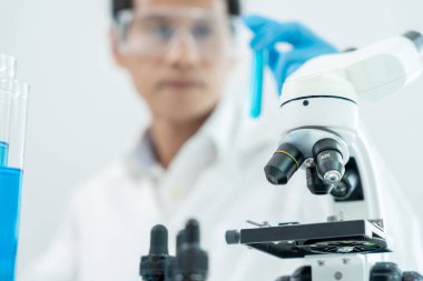 Scientist analyze biochemical sample in advanced scientific laboratory. Medical professional check chemical mix microbiological developmental of viral. Biotechnology research in science lab. cosmetic