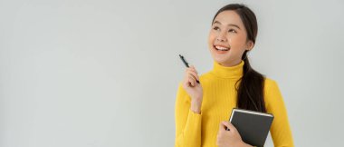 Portrait beautiful Asian woman student. Smile girl happy study. read book in college campus. young female on international Asia University. Education, study, school, learning, exam, continue education