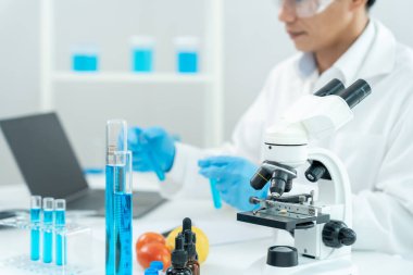 Scientist analyze biochemical sample in advanced scientific laboratory. Medical professional check chemical mix microbiological developmental of viral. Biotechnology research in science lab. cosmetic