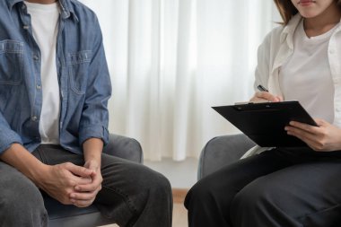 man with mental health problems is consulting. psychiatrist is recording the patient's condition for treatment. encouragement, love and family problem, bipolar , depression patient, protect suicide