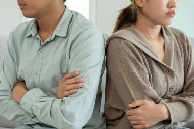 Divorce. Asian couples are desperate and disappointed after marriage. Husband and wife are sad, upset and frustrated after quarrels. distrust, love problems, betrayals. family problem, teenage lov