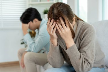 Divorce. Asian couples are desperate and disappointed after marriage. Husband and wife are sad, upset and frustrated after quarrels. distrust, love problems, betrayals. family problem, teenage lov