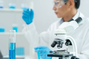 Scientist analyze biochemical sample in advanced scientific laboratory. Medical professional check chemical mix microbiological developmental of viral. Biotechnology research in science lab. cosmetic