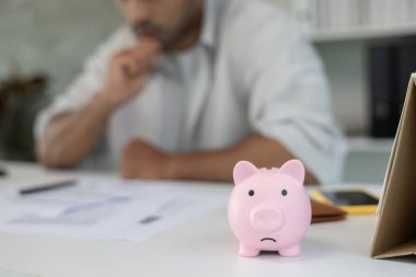 Stressed and headache man with large bills or invoices no money to pay to expenses and credit card debt. shortage, Financial problem, bankruptcy, mortgage, loan, bankrupt, poor, empty wallet 