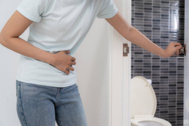 Constipation and diarrhea in bathroom. Hurt woman touch belly  stomach ache painful. colon inflammation problem, toxic food, abdominal pain, abdomen, constipated in toilet, stomachache, Hygiene