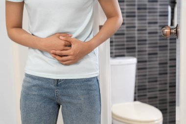 Constipation and diarrhea in bathroom. Hurt woman touch belly  stomach ache painful. colon inflammation problem, toxic food, abdominal pain, abdomen, constipated in toilet, stomachache, Hygiene