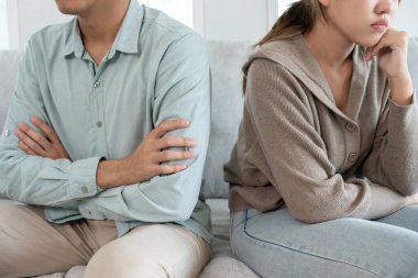 Divorce. Asian couples are desperate and disappointed after marriage. Husband and wife are sad, upset and frustrated after quarrels. distrust, love problems, betrayals. family problem, teenage lov