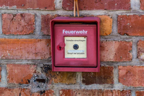 stock image Old German fire alarm on a house wall