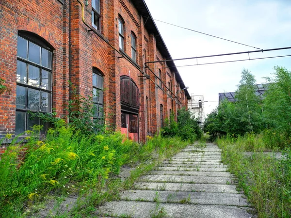 Old red brick factory building