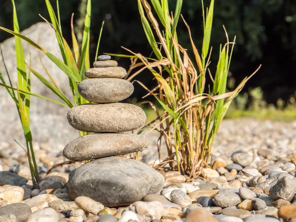 Balancing stones in nature background
