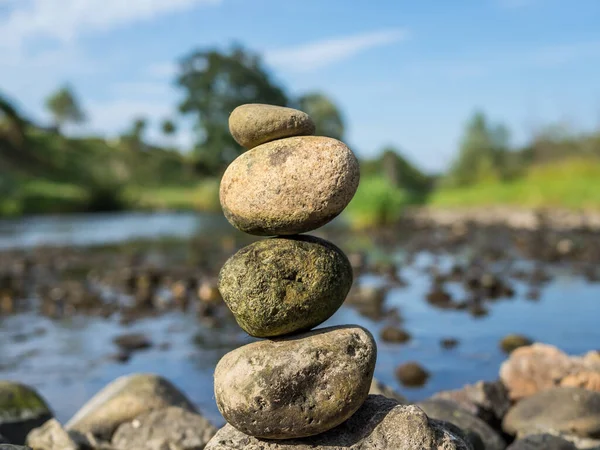 Balance stones by a river